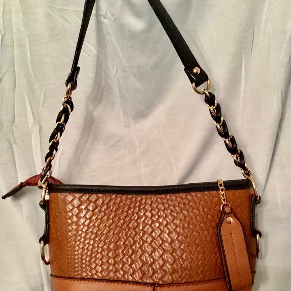 11” wide, 6” high, color is Camel with black accents.